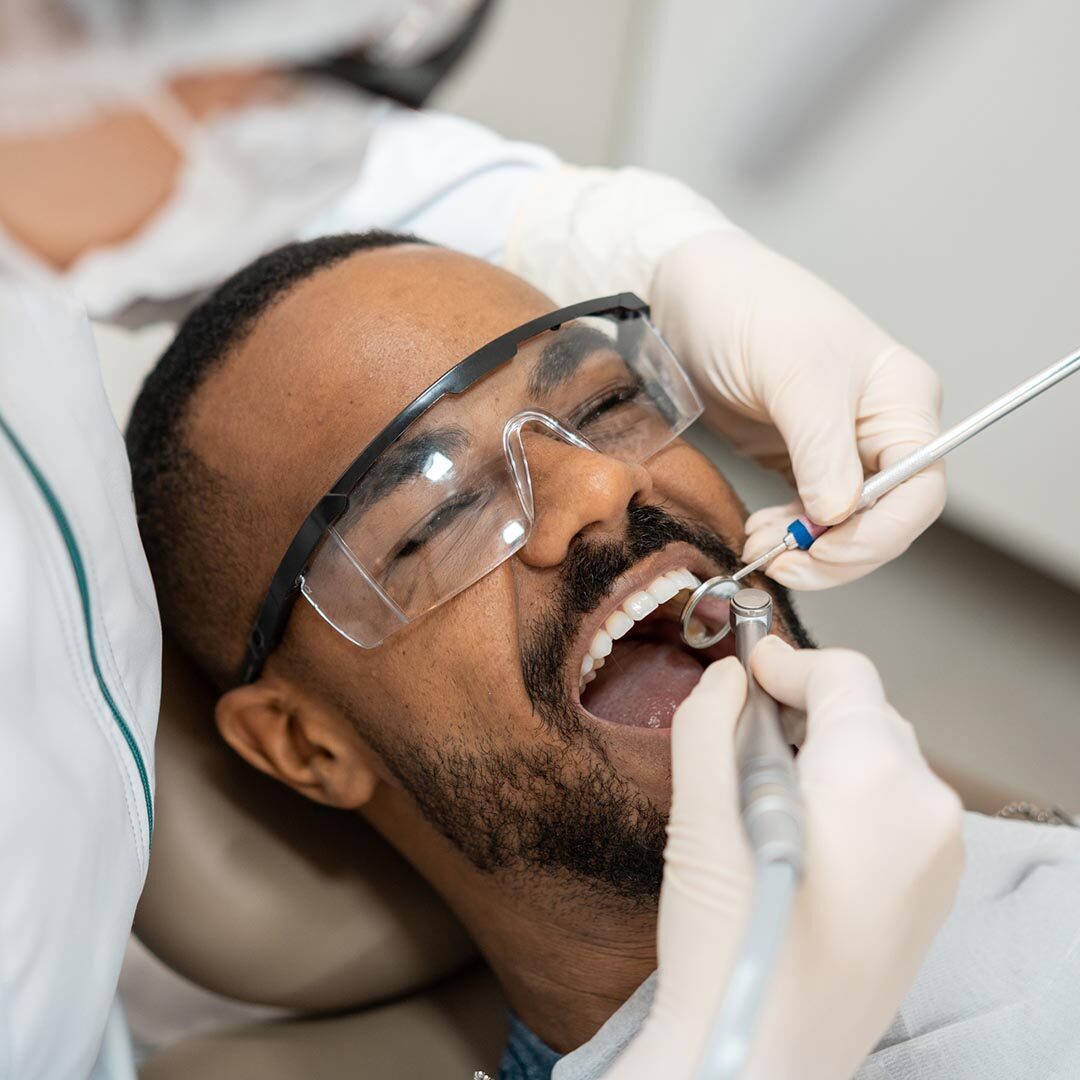 Dentist Using Dental Drill